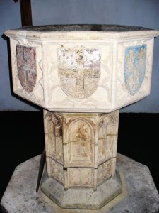 The medieval font at Bramley (originally from a church in Norwich) where the older Baker children were christened, Colin Smith, Geograph.