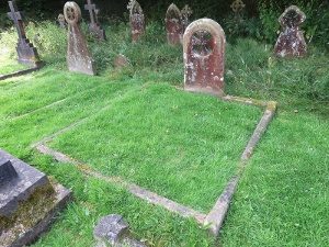 George Ansell's grave is in the top right hand corner of the photograph. The double grave in front is that of his grandparents Richard and Jane Ansell.