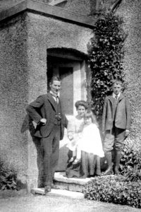 Sarah Jane Boxall with her husband and children outside Dairy Cottage, about 1912 