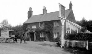 "The Grapes" in 1905. The name came from a vine growing in the glasshouse to the right (photogragh courtesy Barry Ray, Slaugham Archives)