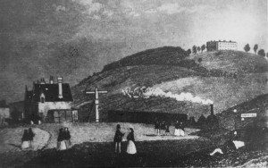 Dorking Town (now West) Railway Station in the 1850s, where materials had been unloaded for Denbies House on the hill behind (Dorking