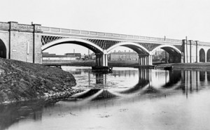 Cubitt's cast iron railway bridge over the River Nene at Peterborough. It still carries the two up lines, but another bridge alongside carries the other lines (Engineering 